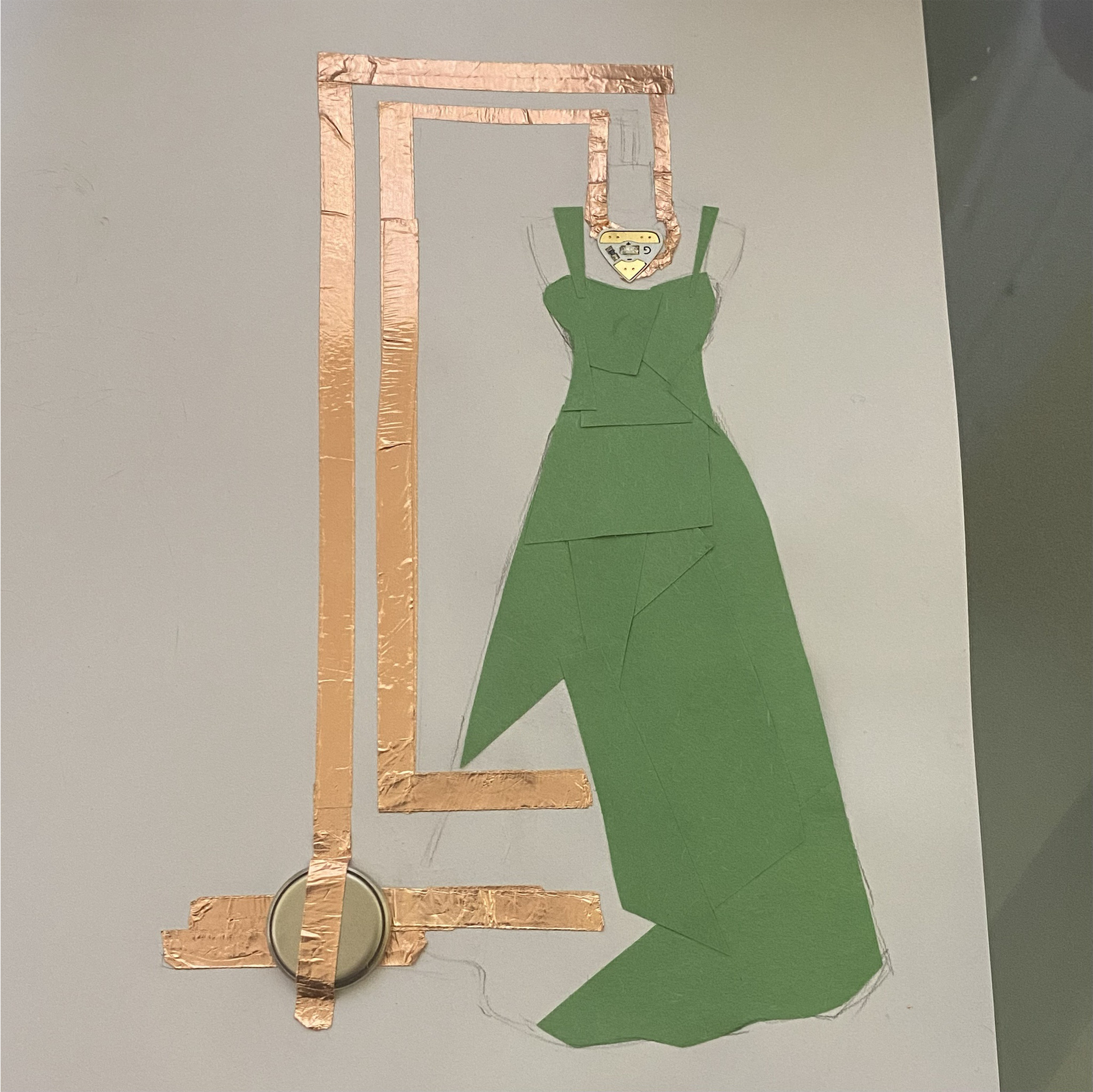 This is an interactive circuit where you can finish the dress by placing the final piece.