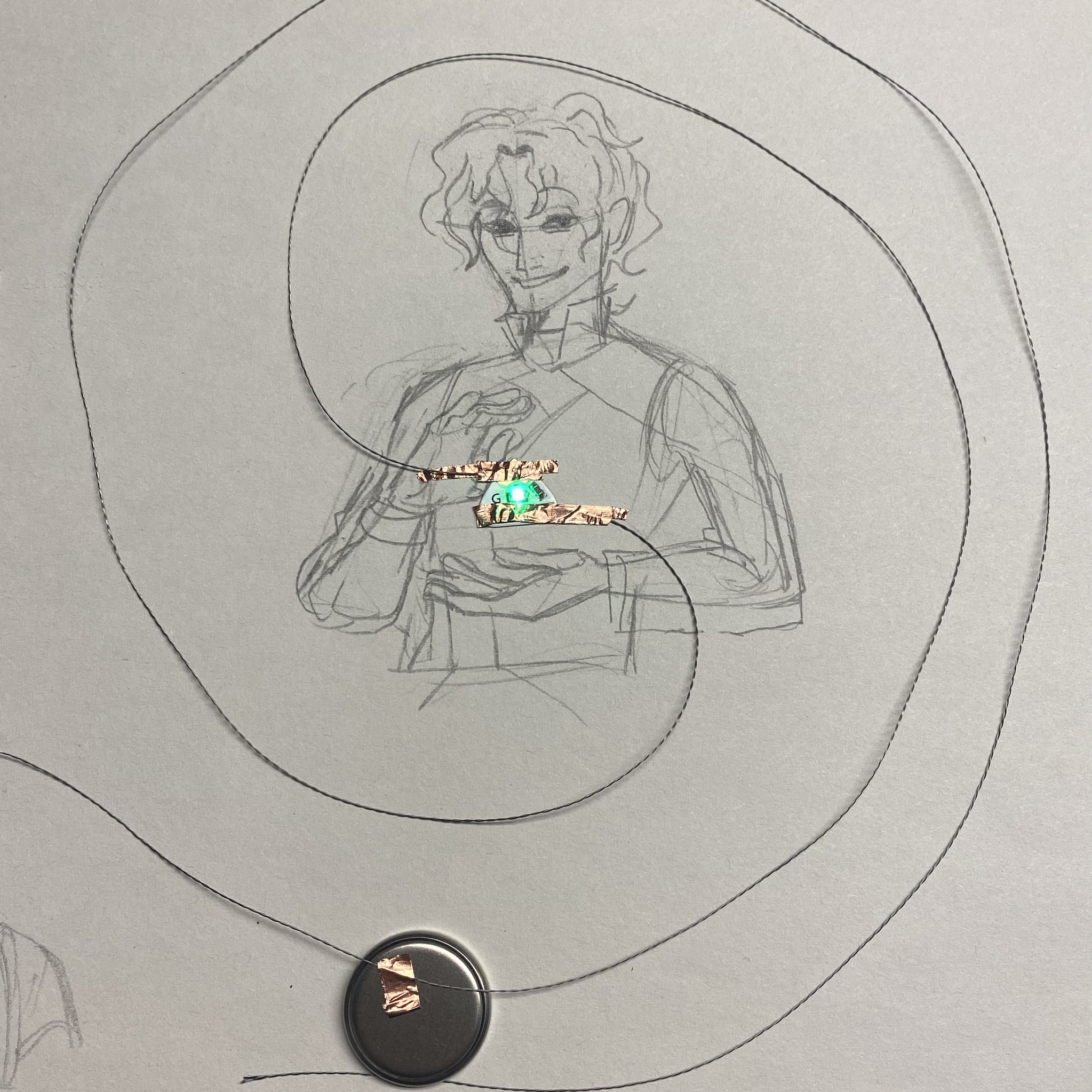 I wanted to take a more illustrative approach while experimenting the wire. One of my characters uses magic, so I wanted him to look like he is using it through the LED. I used the copper wire decoratively to enhance the magic look.