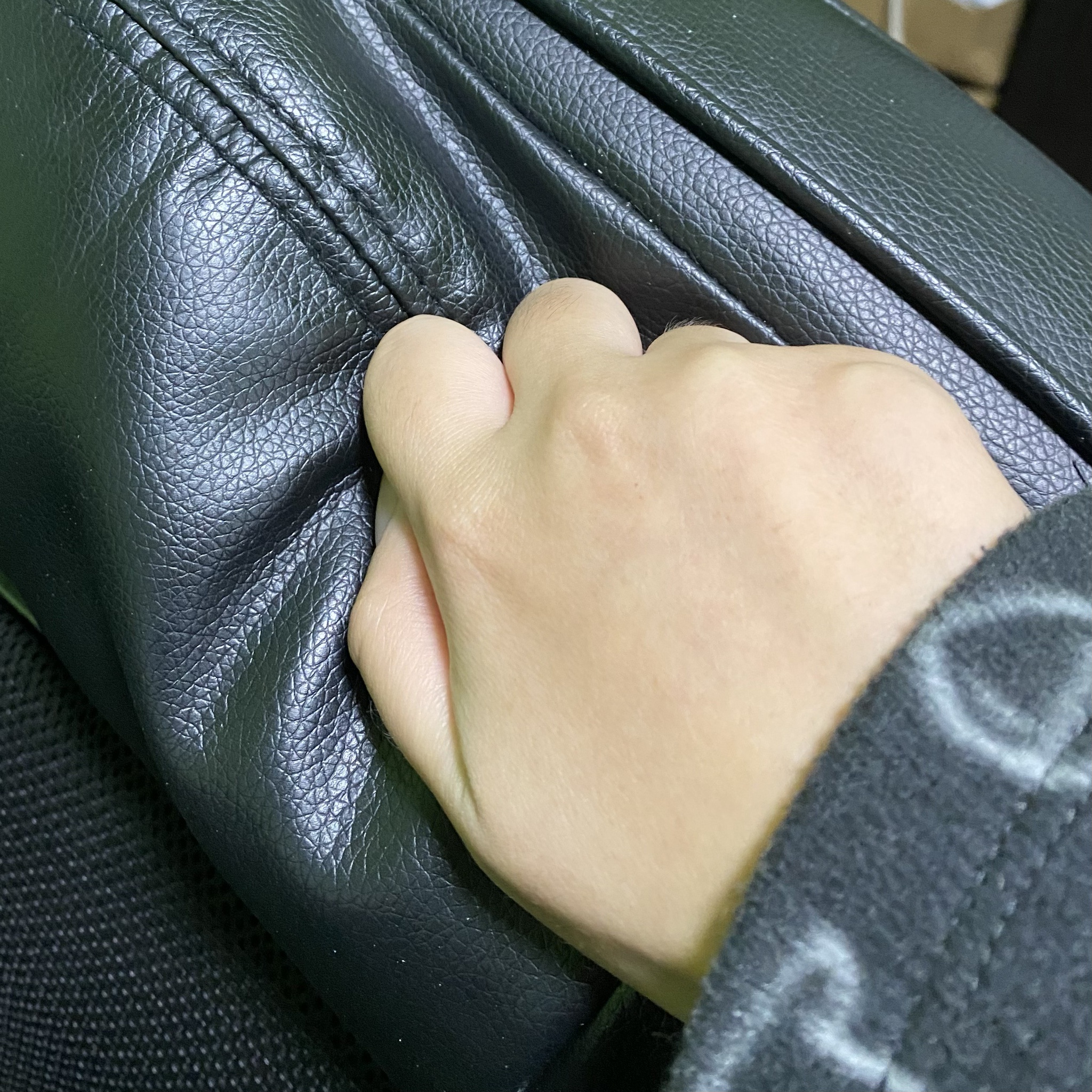 Image of a hand of my work chair.